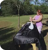 Massage therapist working on client in calming treatment room